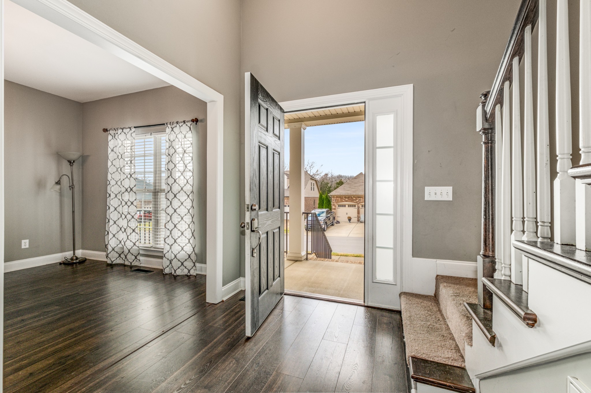 331 Midtown Trail Mount Juliet, TN 37122 - Photo 2 of 30 a view of a hallway with wooden floor and windows