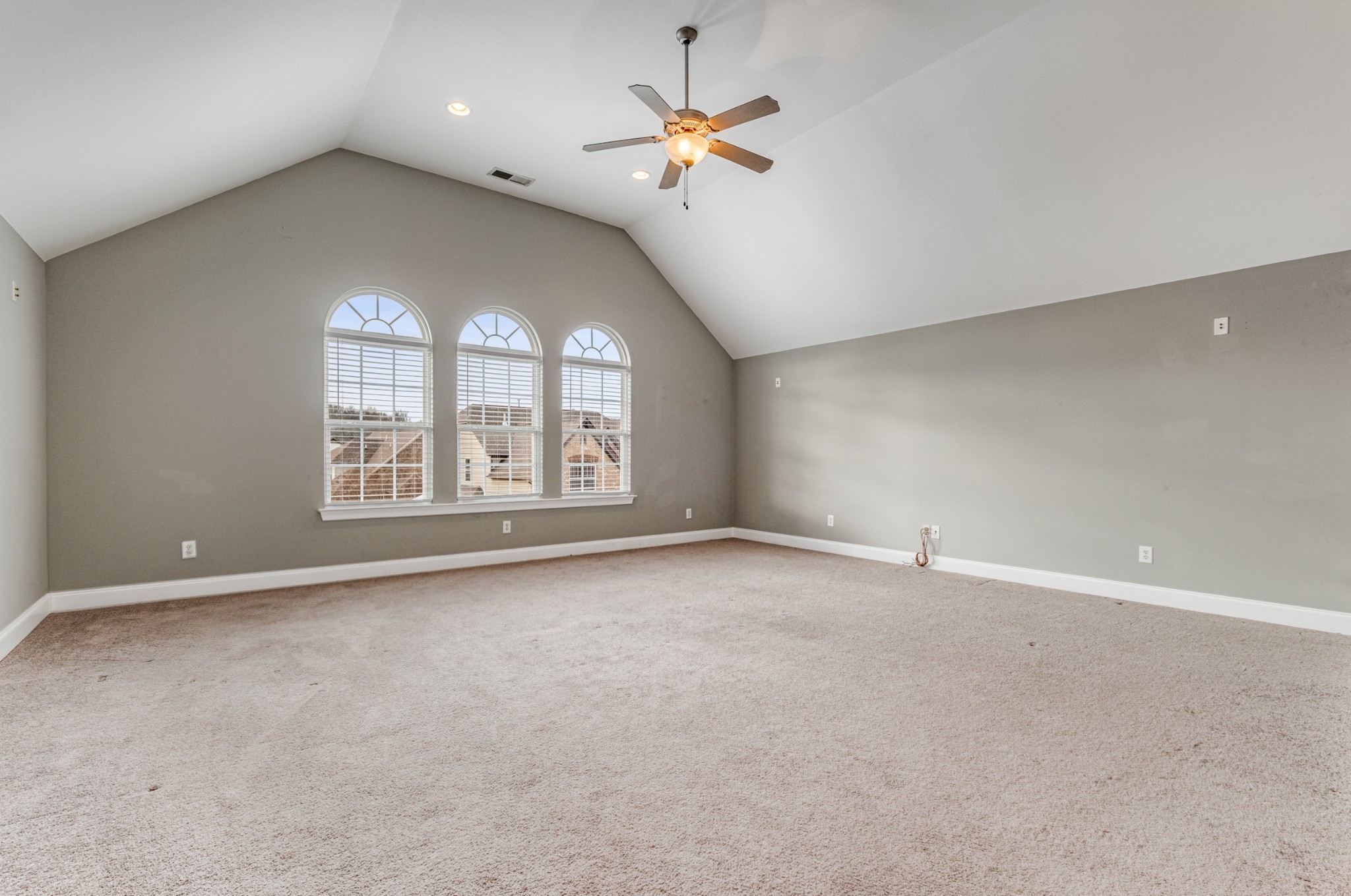331 Midtown Trail Mount Juliet, TN 37122 - Photo 22 of 30 an empty room with a chandelier fan and windows