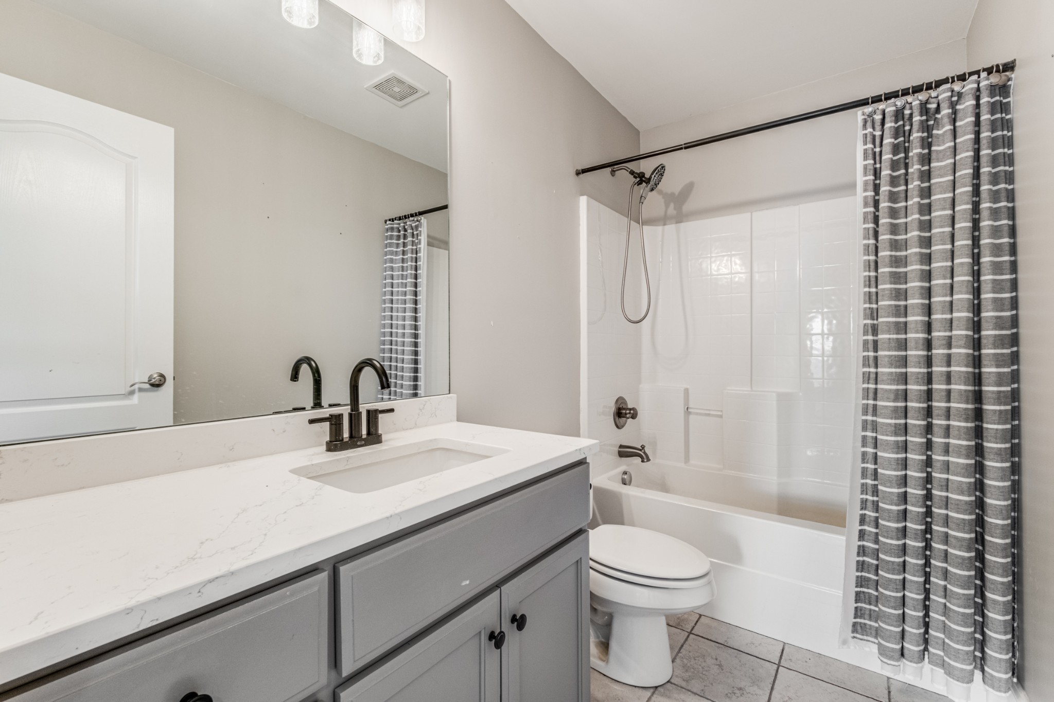 331 Midtown Trail Mount Juliet, TN 37122 - Photo 23 of 30 a bathroom with a sink a toilet and shower