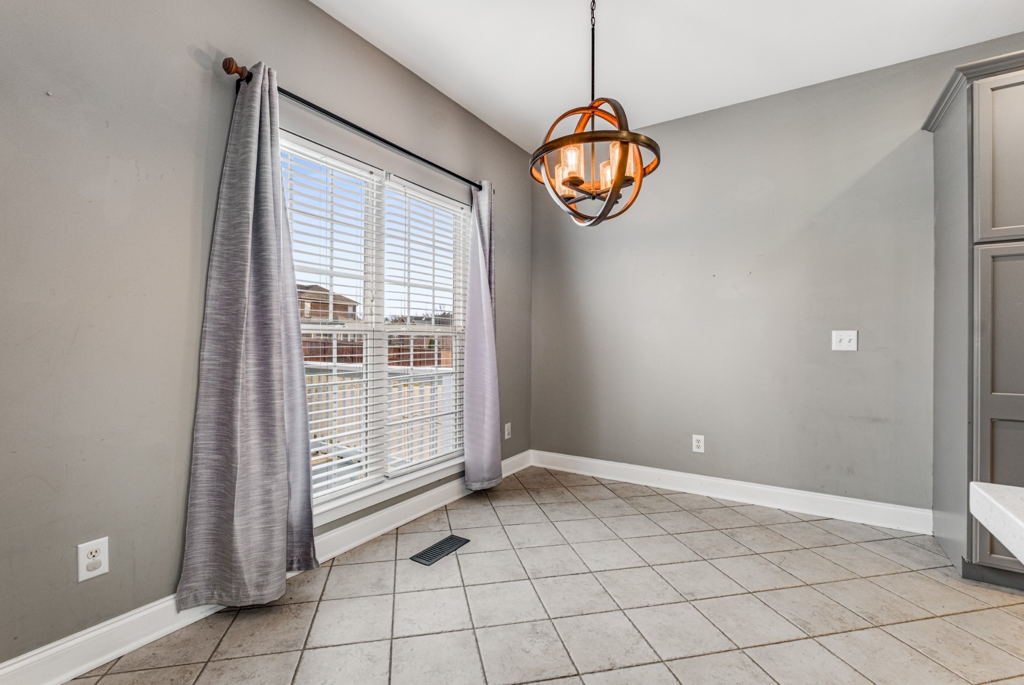 331 Midtown Trail Mount Juliet, TN 37122 - Photo 7 of 30 a view of a room with racks on the wall and a window