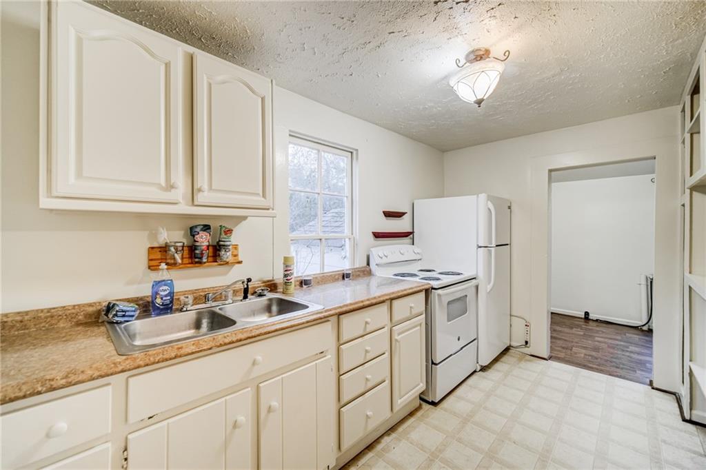 1290 Reavis Mountain Road Ball Ground, GA 30107 - Photo 2 of 35