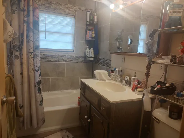 a bathroom with a sink and a bathtub
