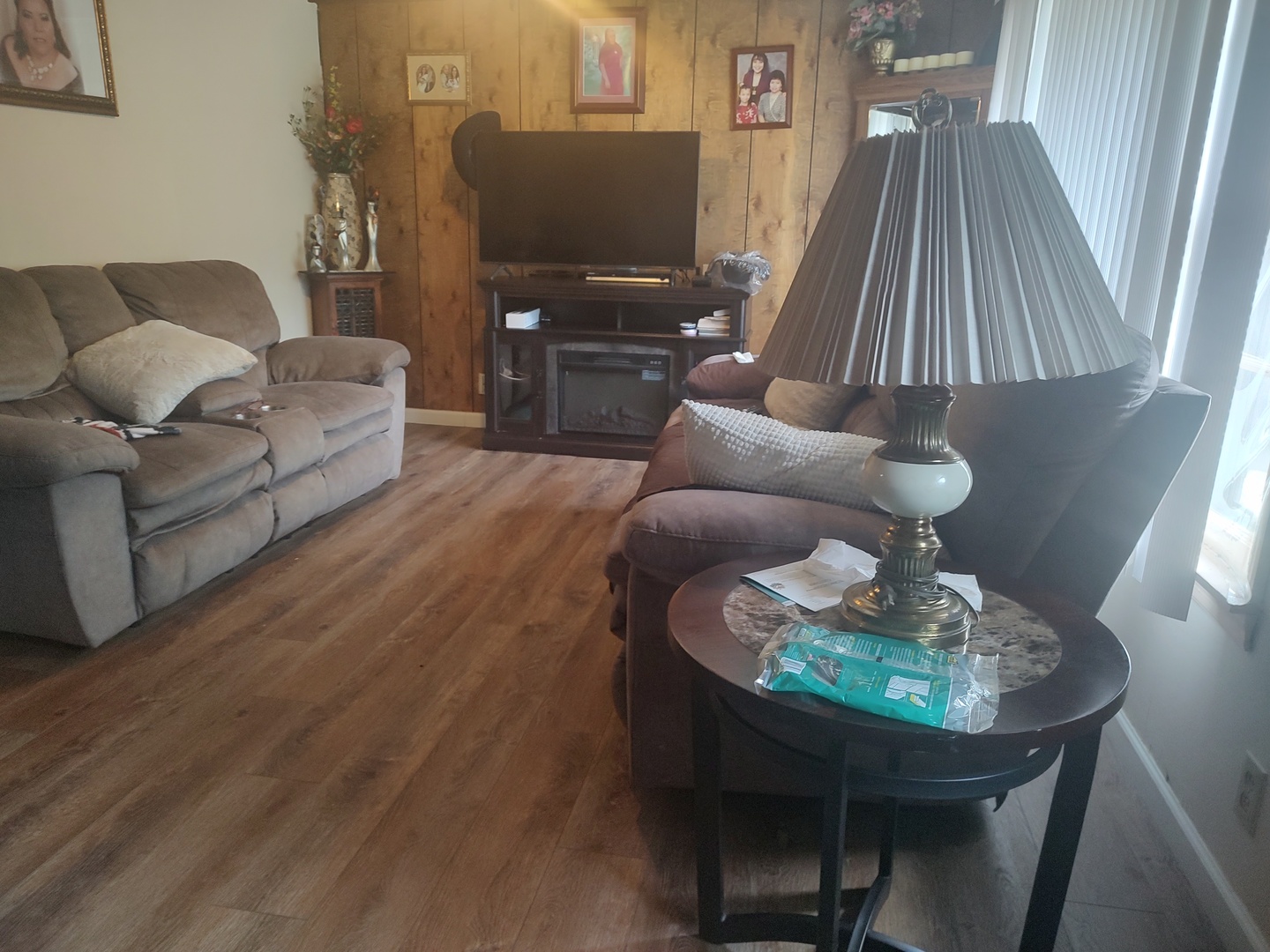 1045 Palace Street Aurora, IL 60506 - Photo 7 of 28 a living room with furniture and a flat screen tv