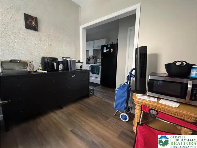 a view of workspace with wooden floor