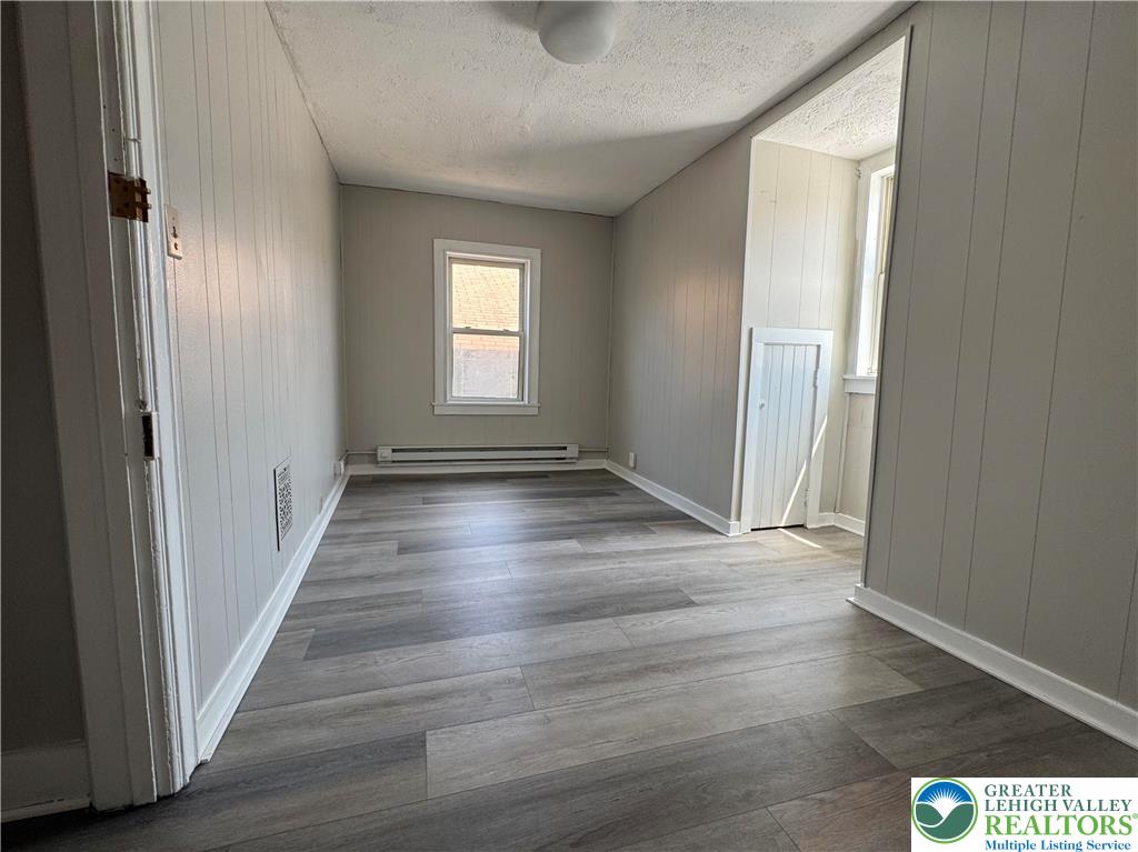 463 Montclair Avenue Bethlehem, PA 18015 - Photo 9 of 29 a view of a hallway with wooden floor