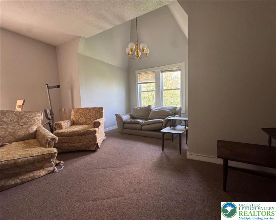 463 Montclair Avenue Bethlehem, PA 18015 - Photo 10 of 29 a living room with furniture and a chandelier