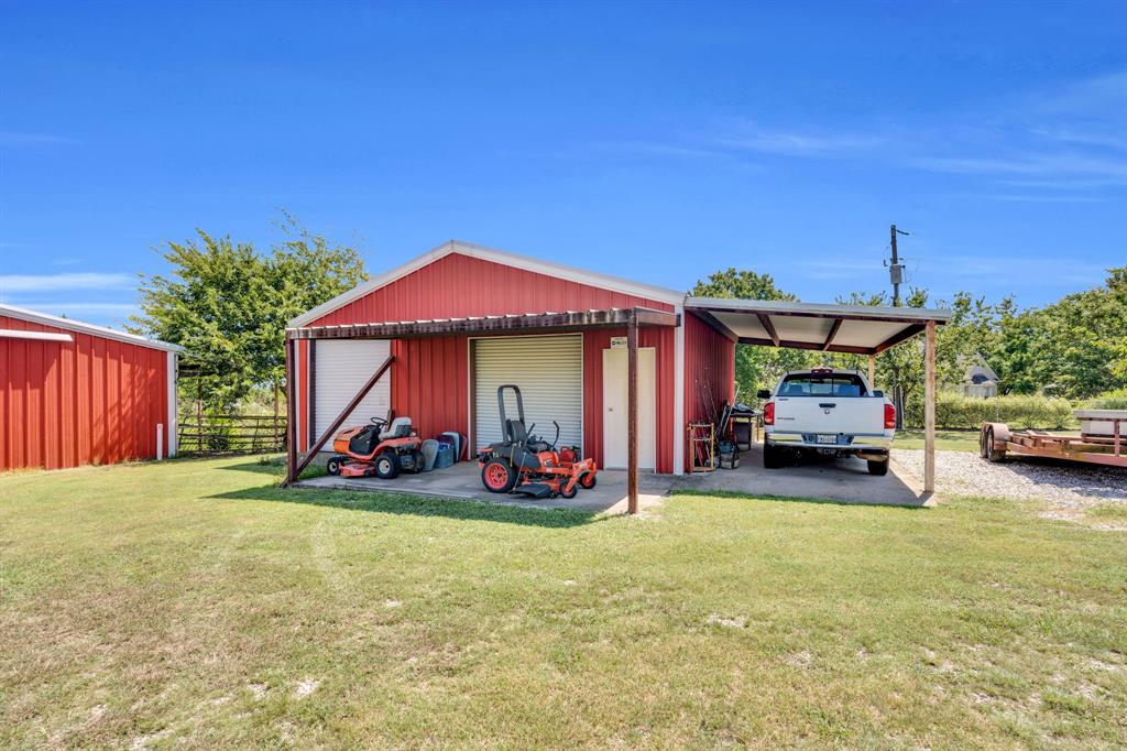 154 Richard Road Waxahachie, TX 75167 - Photo 34 of 38 a view of a house with backyard and porch