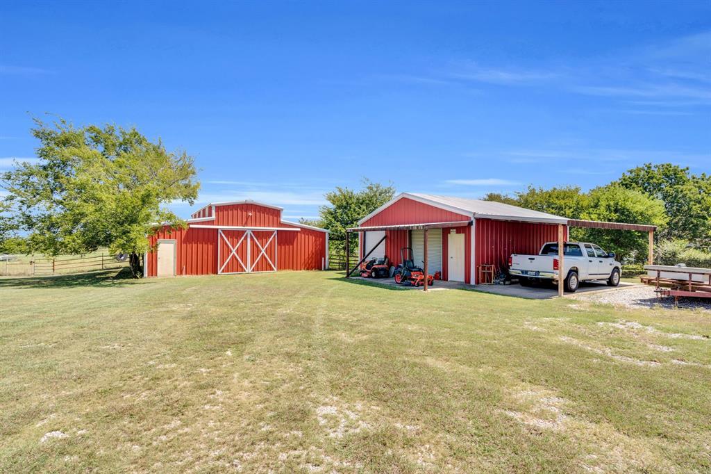 154 Richard Road Waxahachie, TX 75167 - Photo 35 of 38 a view of a house with a yard