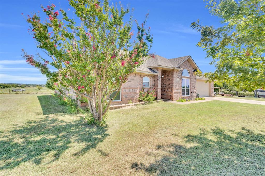 154 Richard Road Waxahachie, TX 75167 - Photo 5 of 38 a view of a house with a yard