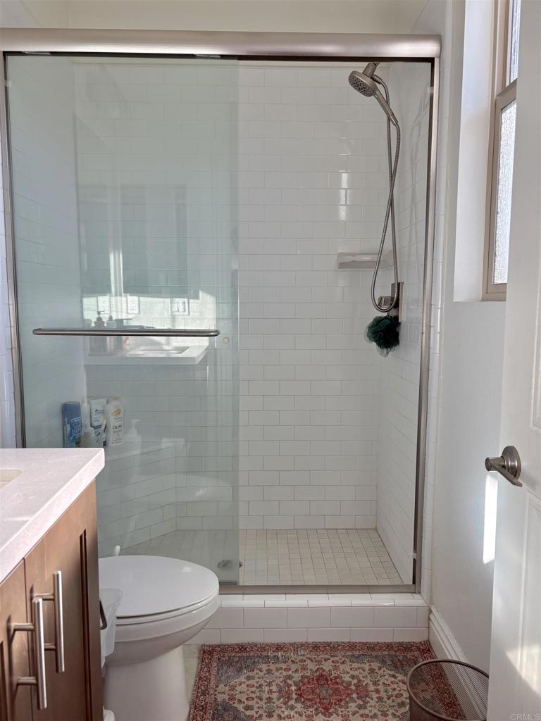 39529 Dayspring Way Temecula, CA 92591 - Photo 38 of 49 a bathroom with a shower a toilet and a sink