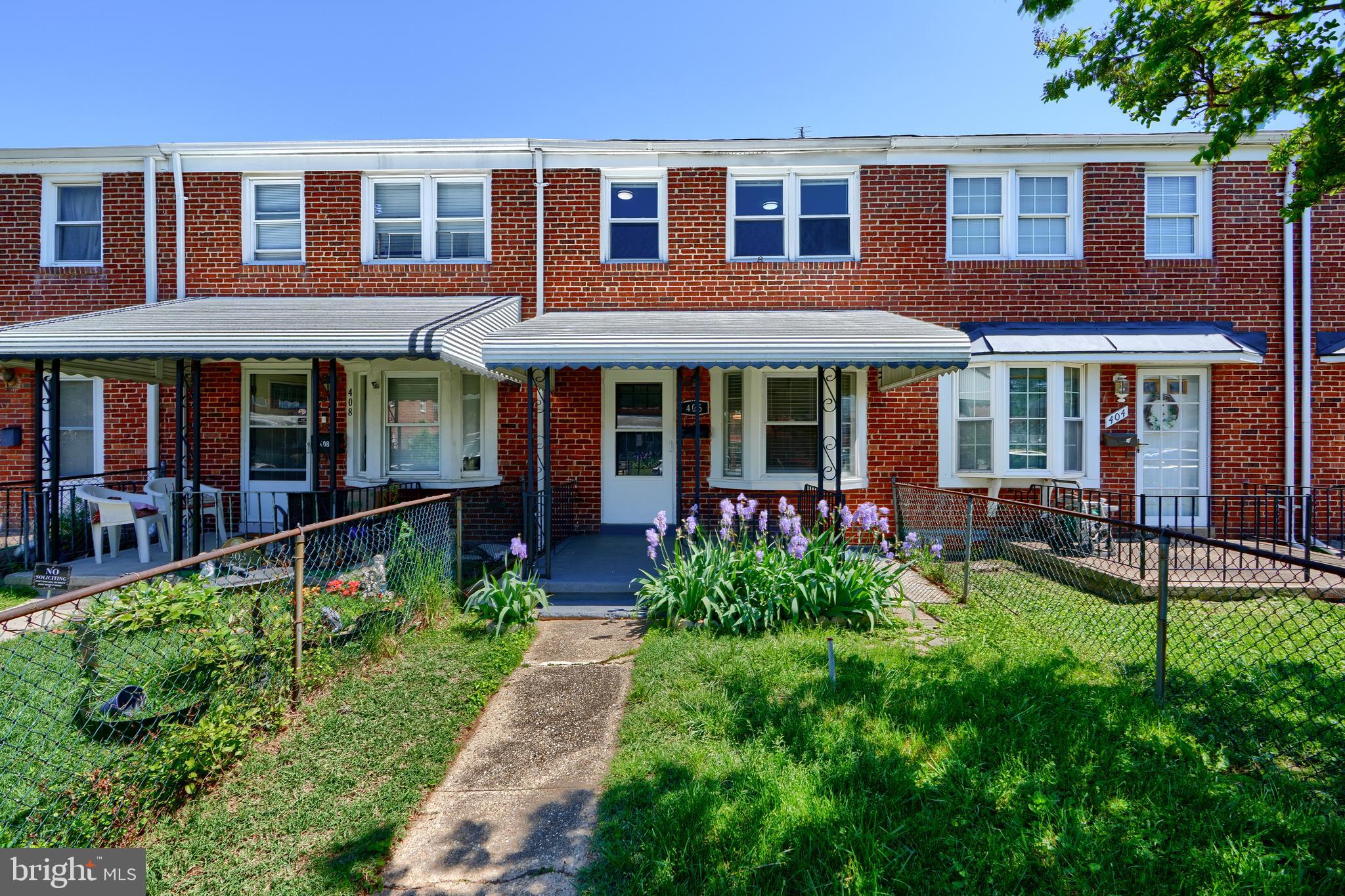406 Torner Road Baltimore, MD 21221 - Photo 1 of 35 front view of a house with a yard