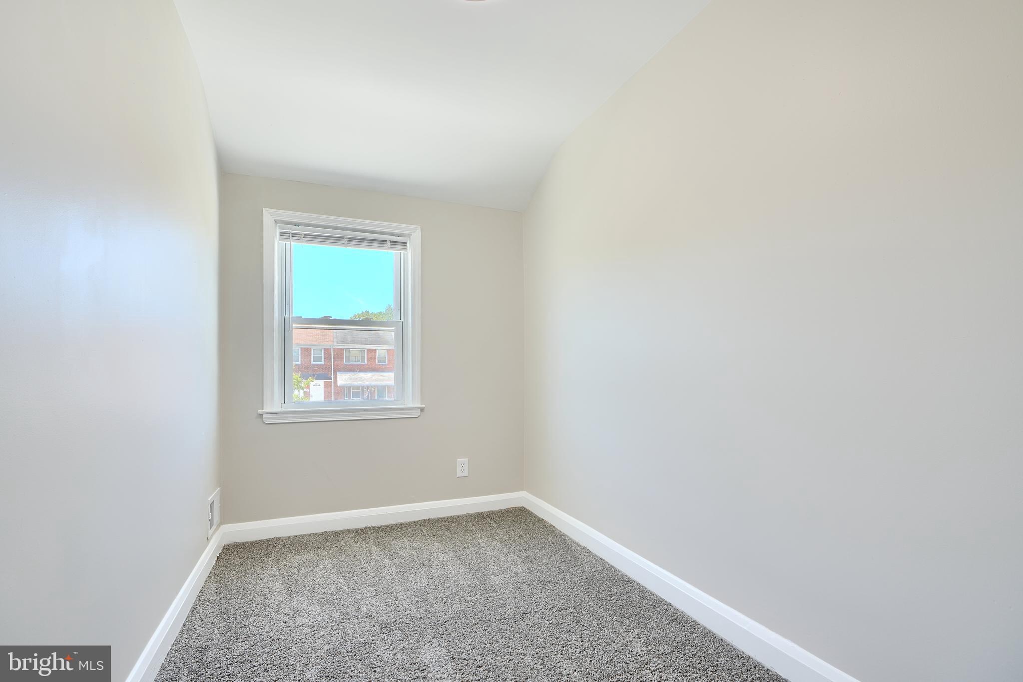 406 Torner Road Baltimore, MD 21221 - Photo 25 of 35 an empty room with a window
