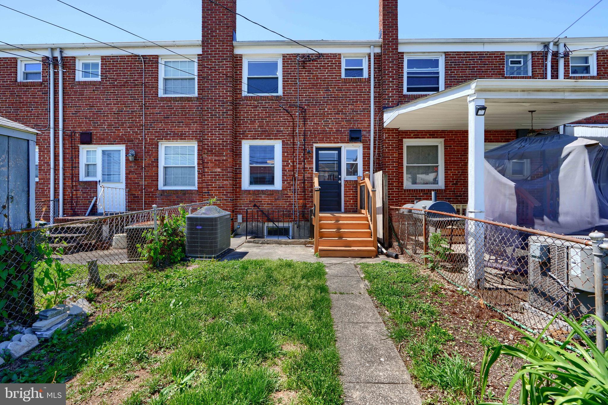 406 Torner Road Baltimore, MD 21221 - Photo 32 of 35 a front view of a building with garden