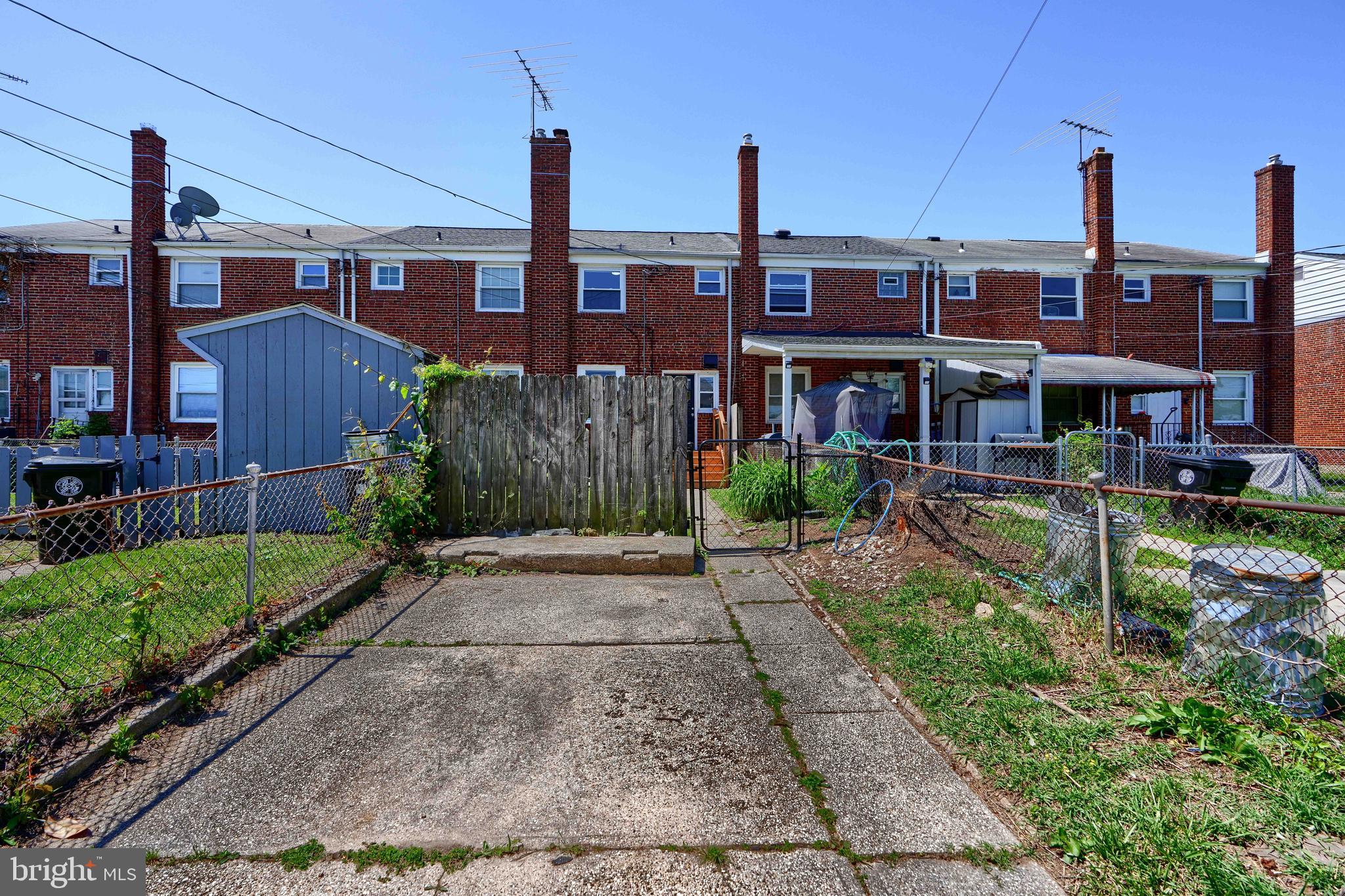 406 Torner Road Baltimore, MD 21221 - Photo 33 of 35 a front view of a building with garden