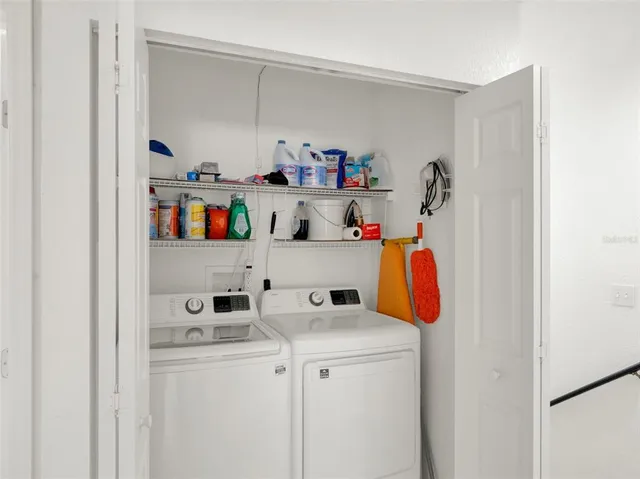 a utility room with dryer and washer