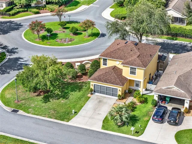 an aerial view of a house with garden