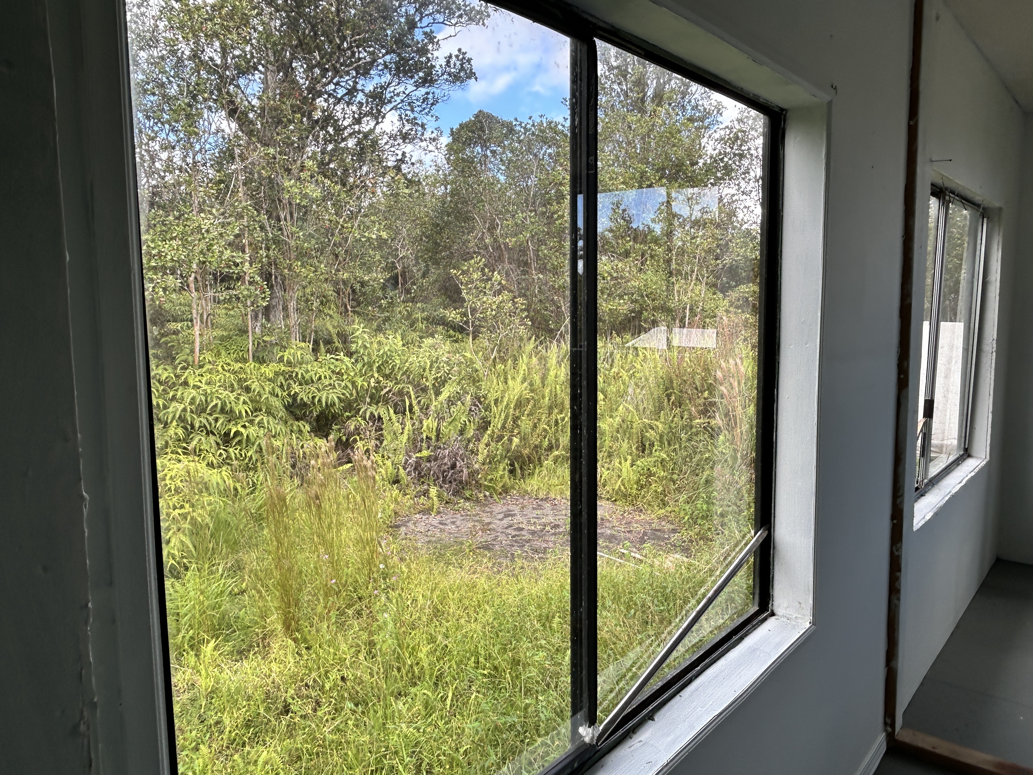11-1834 Kolea Street Mountain View, HI 96771 - Photo 13 of 30 a view of bathroom from window