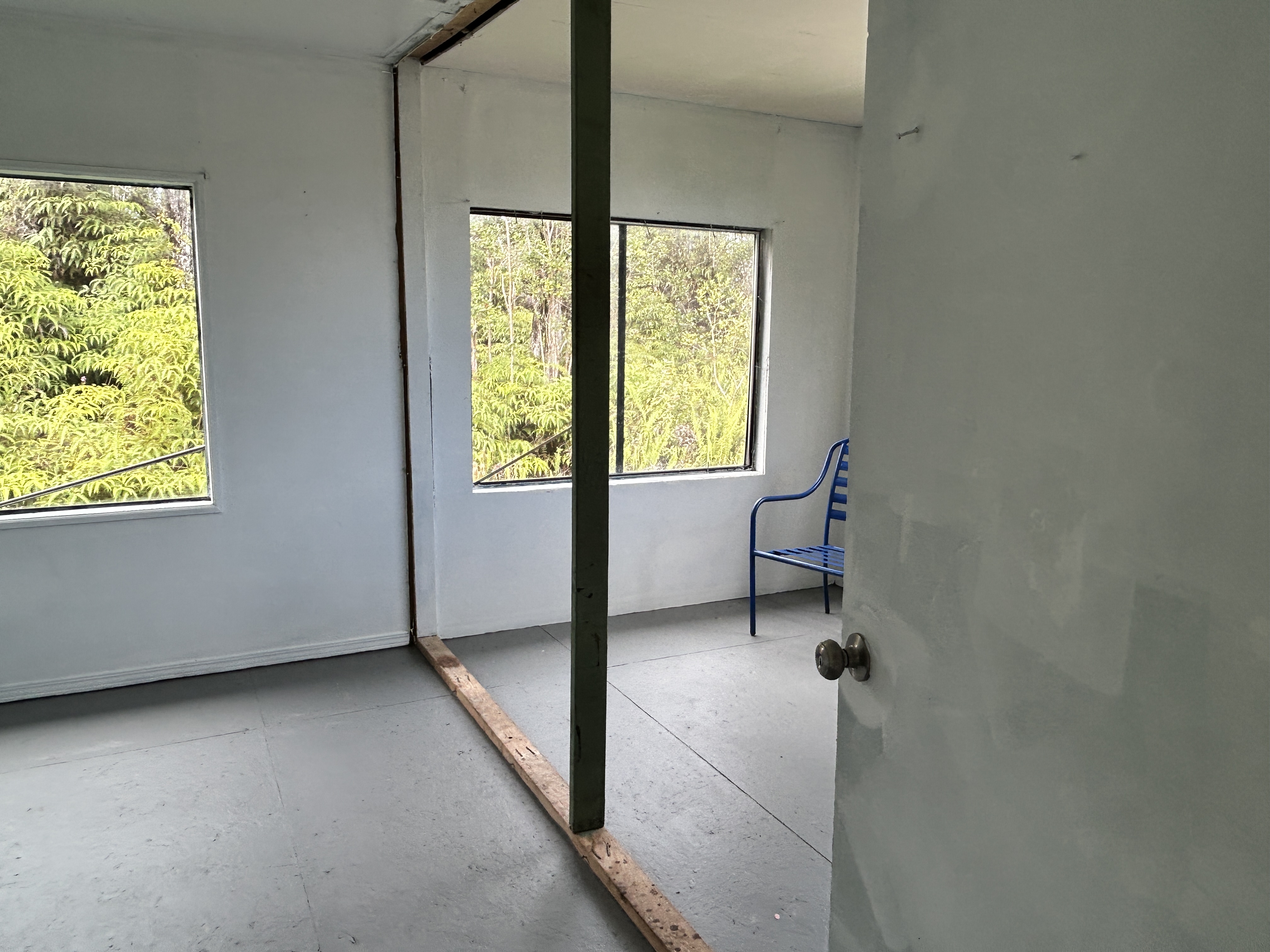 11-1834 Kolea Street Mountain View, HI 96771 - Photo 16 of 30 a living room with furniture and a window