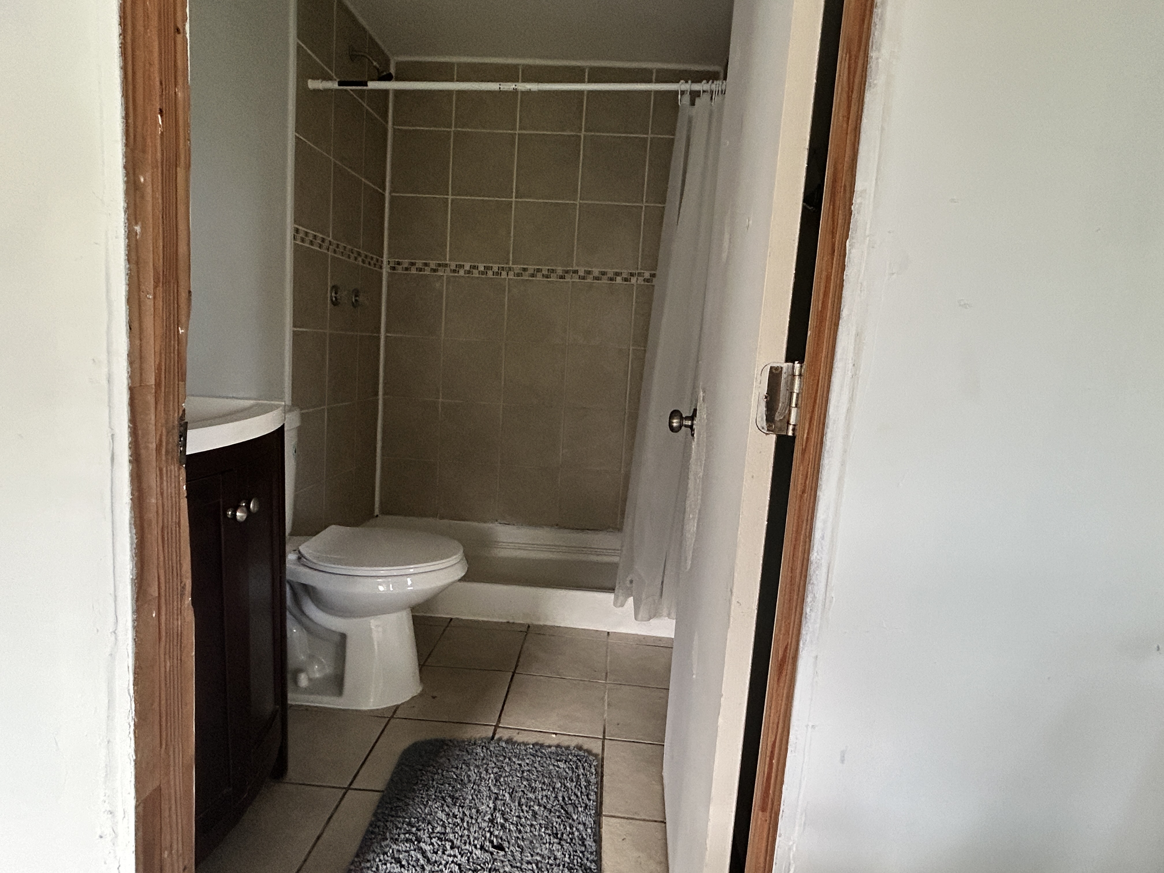 11-1834 Kolea Street Mountain View, HI 96771 - Photo 17 of 30 a bathroom with a toilet and a shower