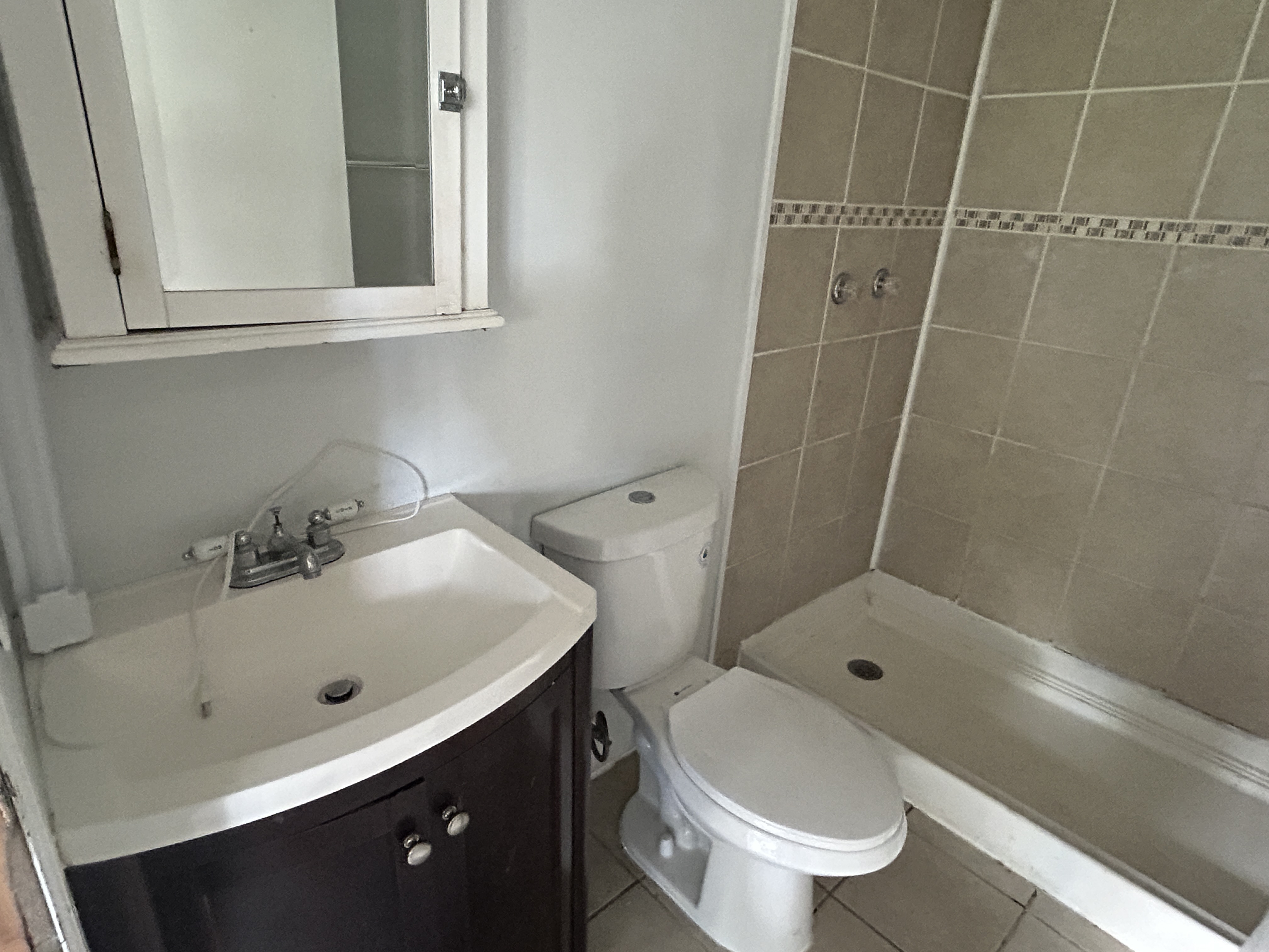 11-1834 Kolea Street Mountain View, HI 96771 - Photo 18 of 30 a bathroom with a sink toilet and shower