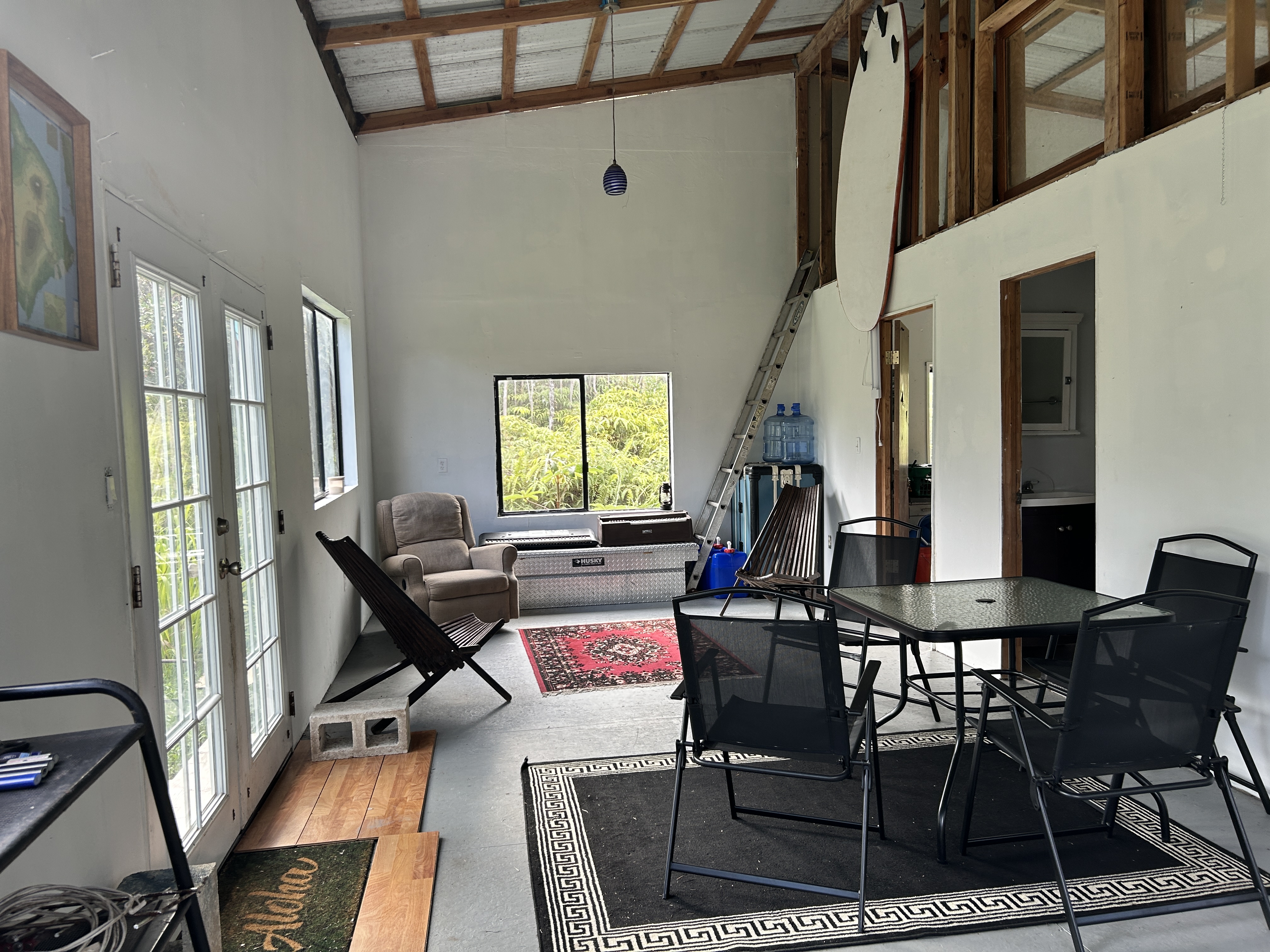 11-1834 Kolea Street Mountain View, HI 96771 - Photo 24 of 30 a view of a livingroom with dining room and furniture