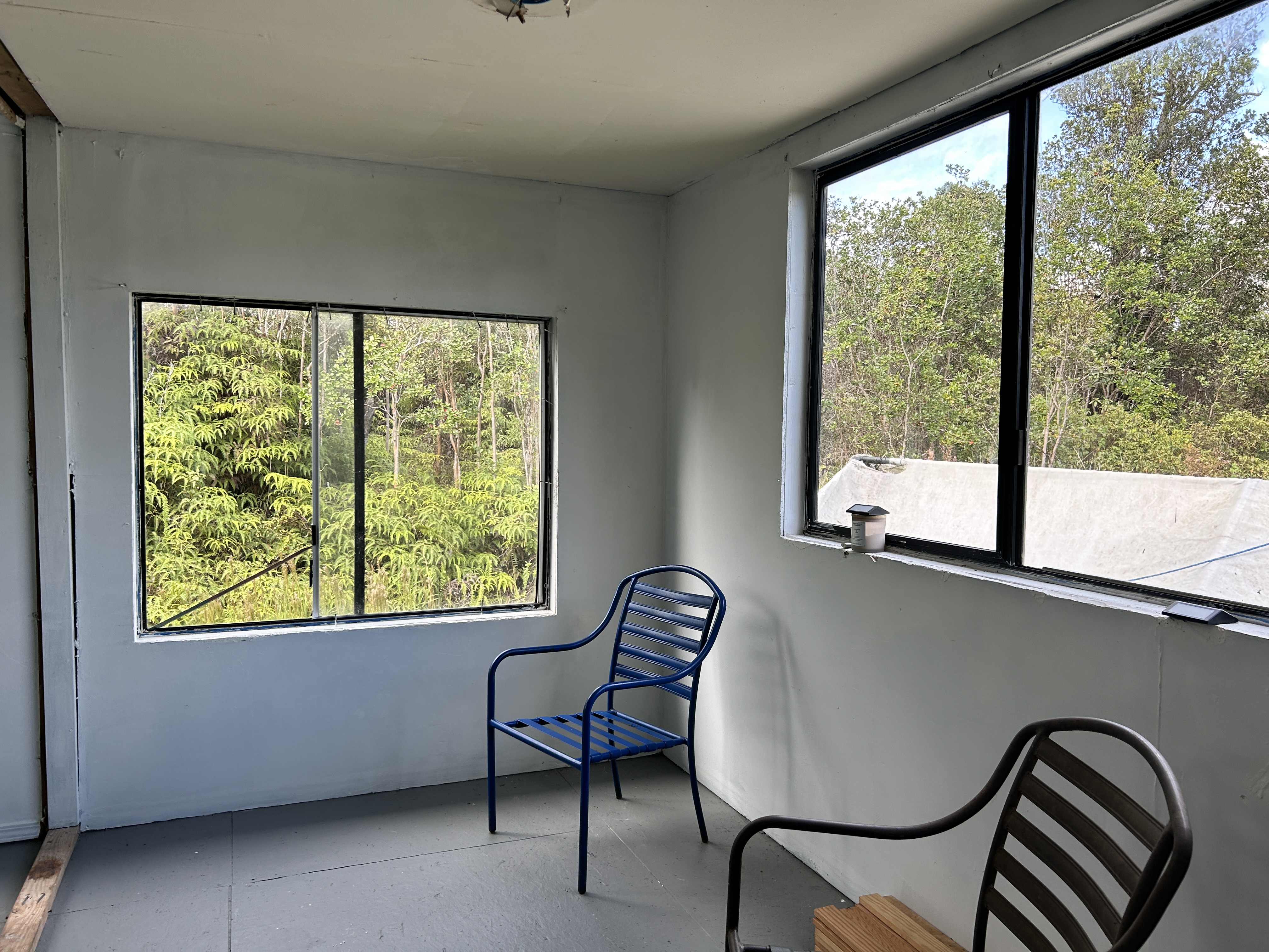11-1834 Kolea Street Mountain View, HI 96771 - Photo 4 of 30 a view of a room with furniture and windows