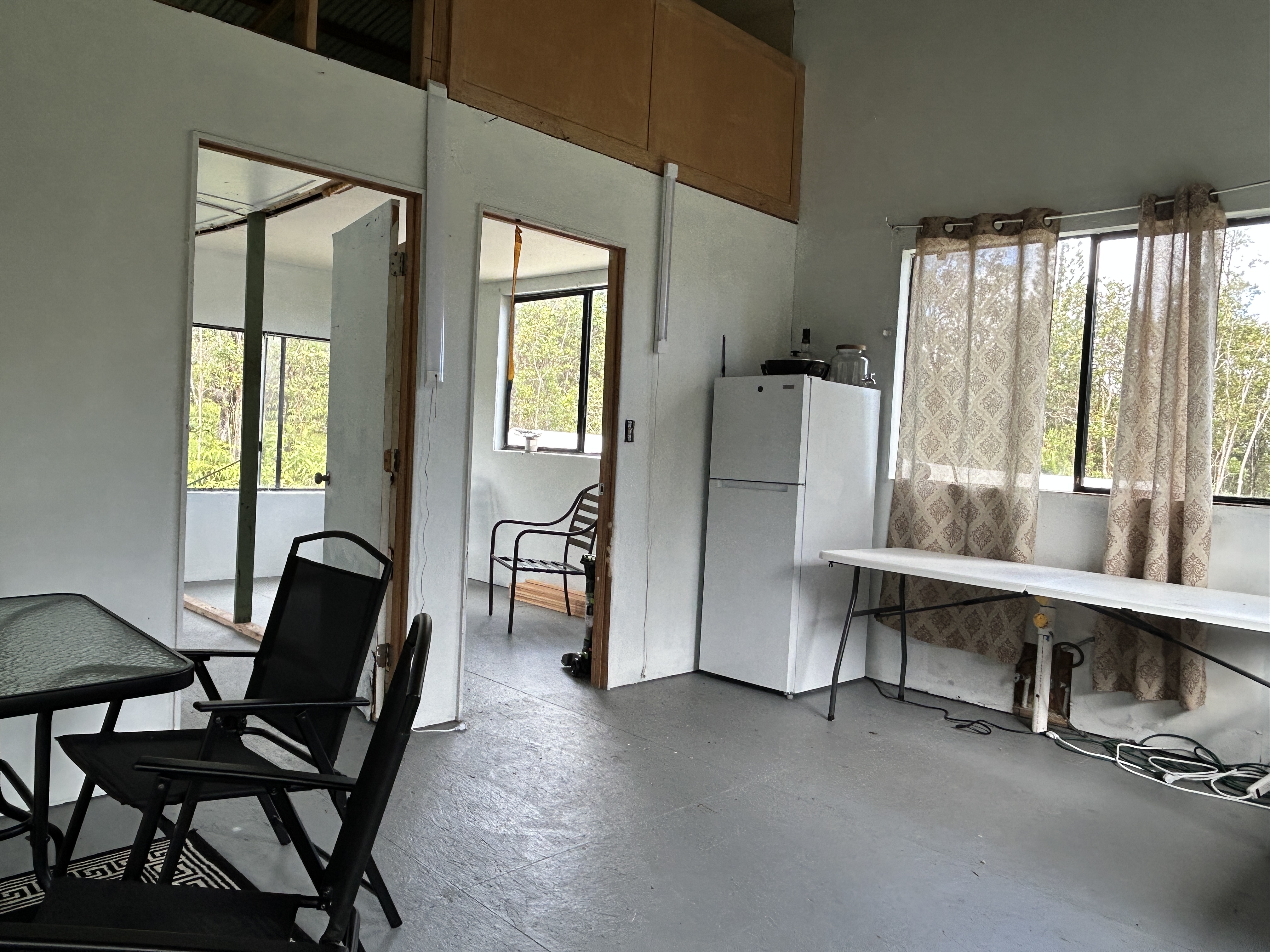 11-1834 Kolea Street Mountain View, HI 96771 - Photo 7 of 30 a dining room with furniture and window