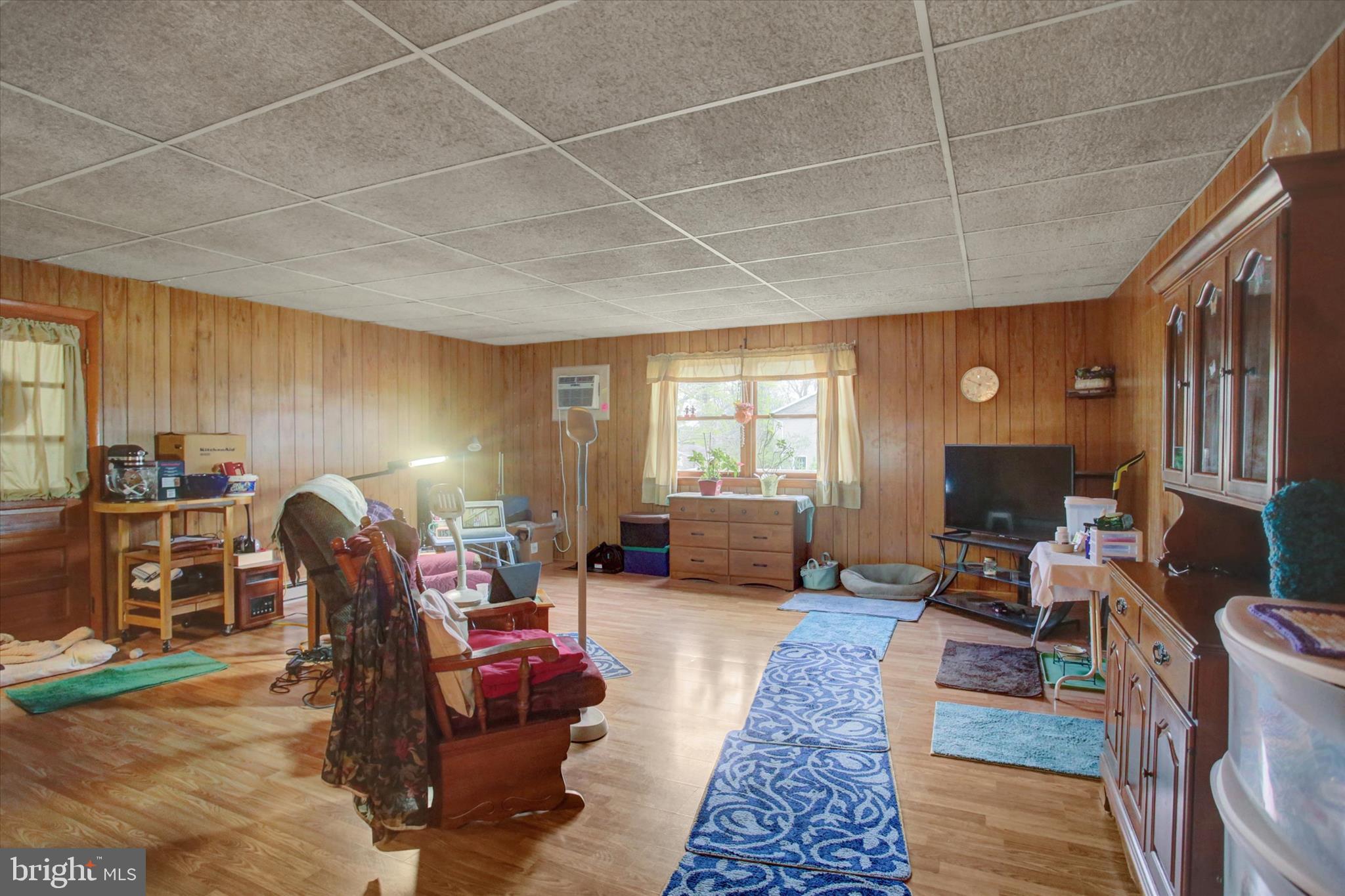 2165 Hafer Road Fayetteville, PA 17222 - Photo 24 of 35 a living room with furniture a window and a fireplace