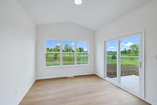 a view of a room with a large window