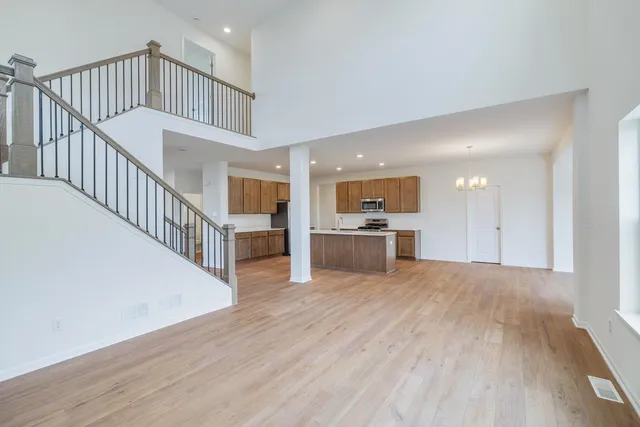 a view of kitchen with wooden floor