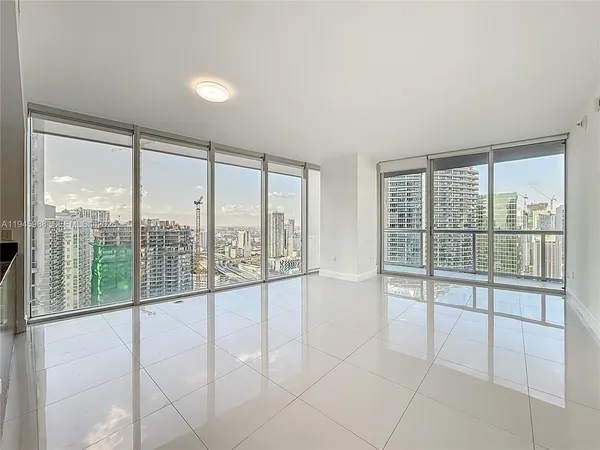 a view of an empty room and window