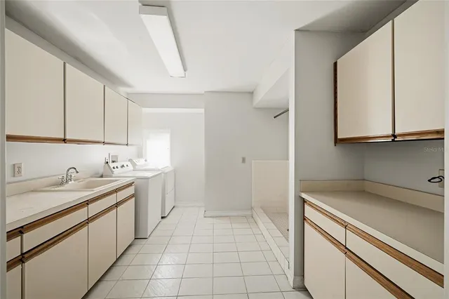 a view of a house with couches chairs and a fire pit