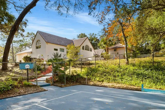 a front view of a house with swimming pool