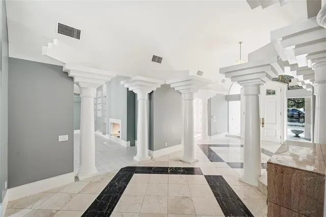 a bathroom with a tub shower and sink