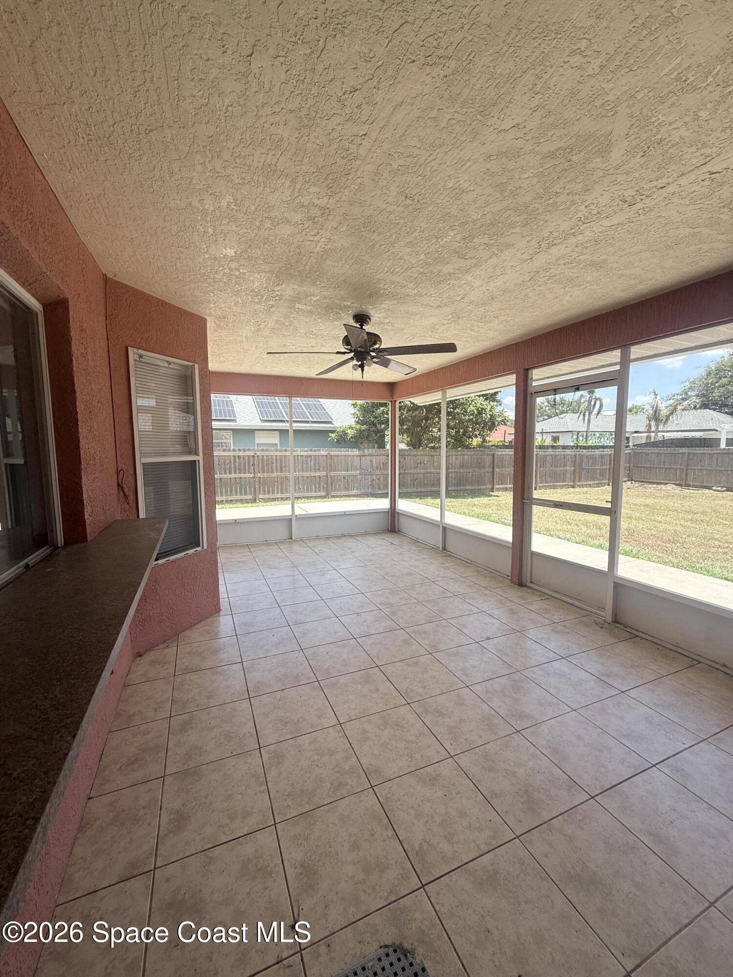 1660 Wake Forest Road Northwest Palm Bay, FL 32907 - Photo 12 of 15 Large screened in porch