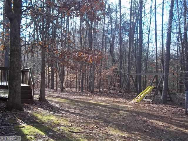 4912 Gold Crest Drive Oak Ridge, NC 27310 - Photo 3 of 16 Yard/Garden.