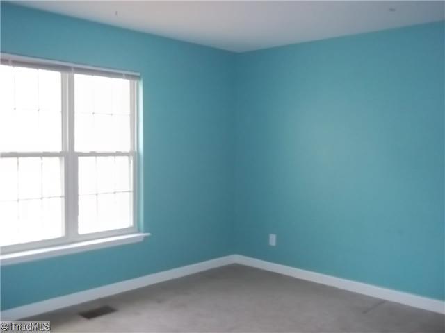 4912 Gold Crest Drive Oak Ridge, NC 27310 - Photo 9 of 16 1st Bedroom.