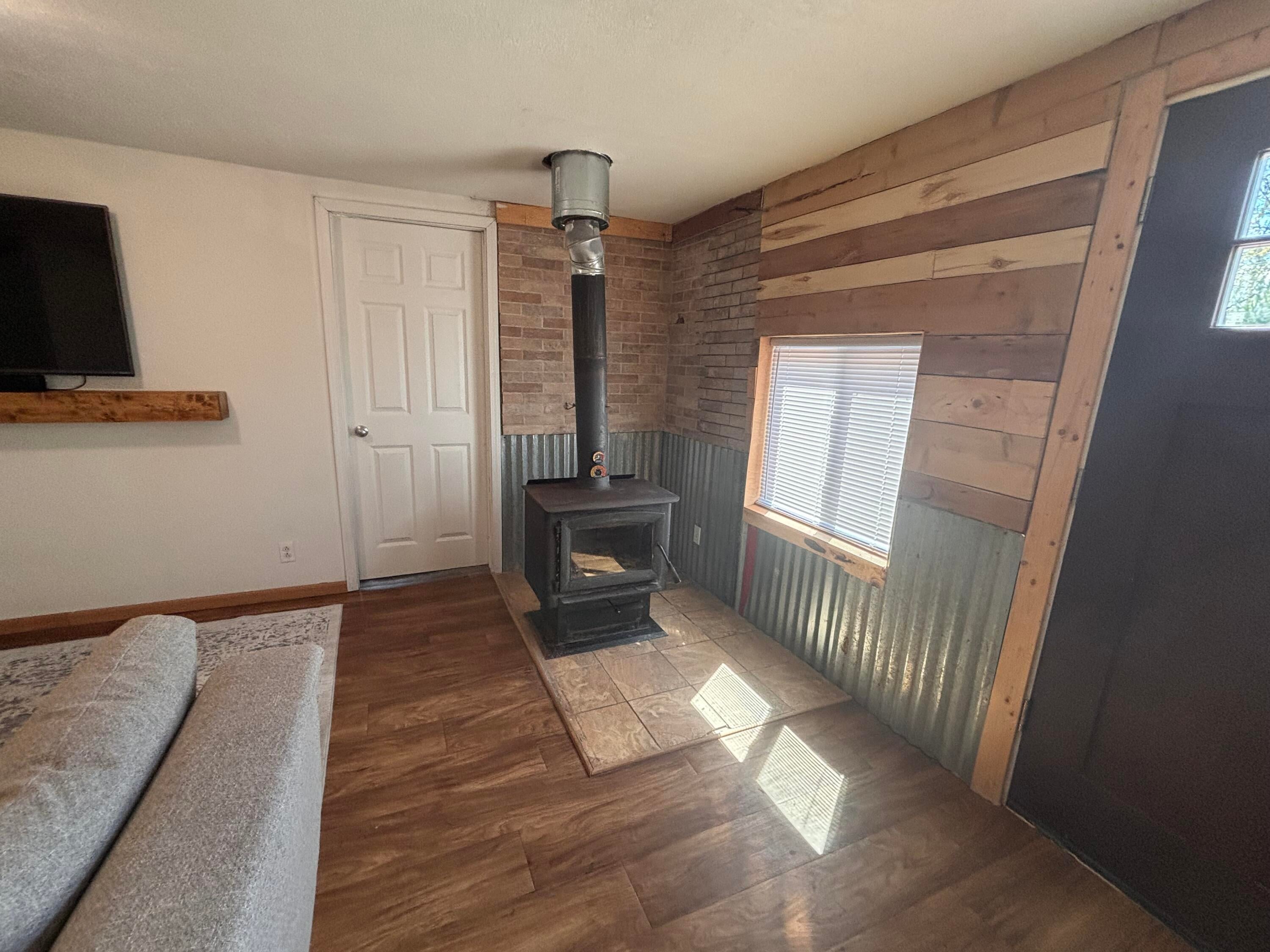5203 Truax Road Lachine, MI 49753 - Photo 7 of 24 wood stove