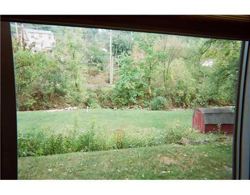 14 Sioux Road Bethel Park, PA 15241 - Photo 10 of 18 Land/Lot. BACKYARD VIEW FROM GREAT ROOM
