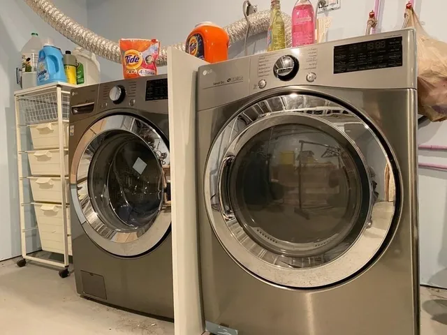 a utility room with dryer and washer