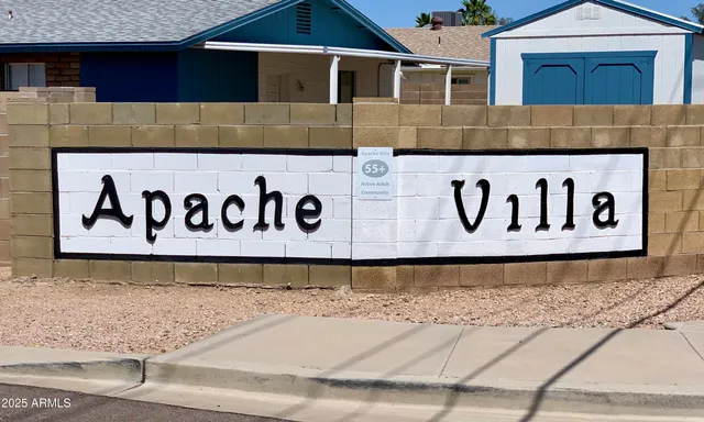 a swimming pool with outdoor seating yard and patio