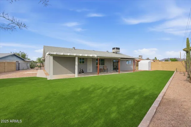 a view of a backyard with mountain view