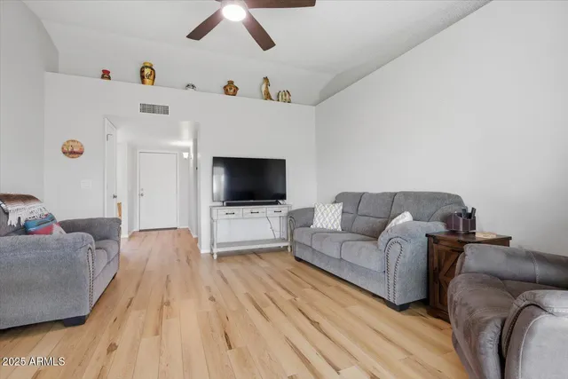 a bathroom with a shower sink and mirror