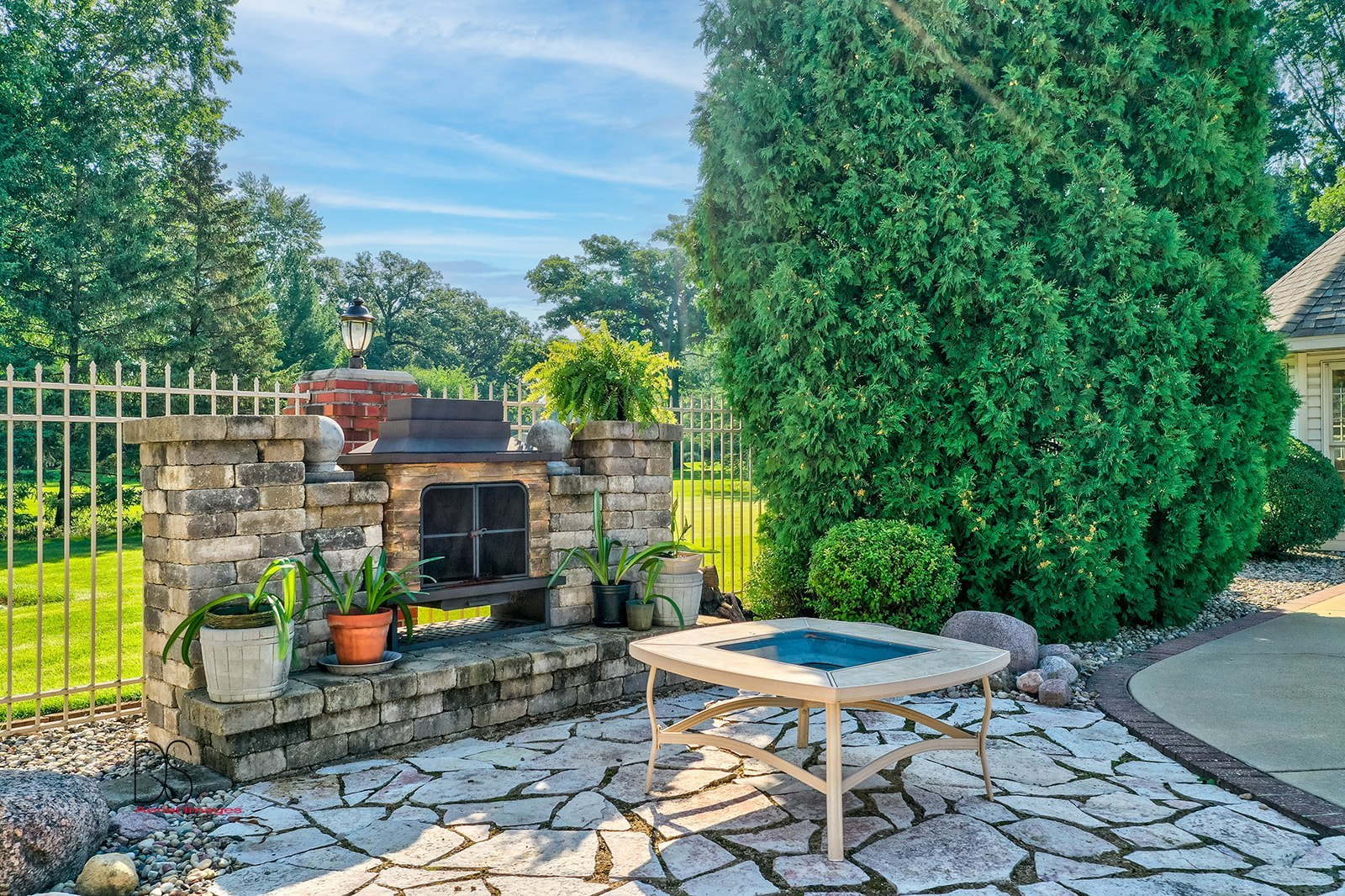 1638 Timber Lane Ottawa, IL 61350 - Photo 14 of 50 a view of a patio with table and chairs and potted plants