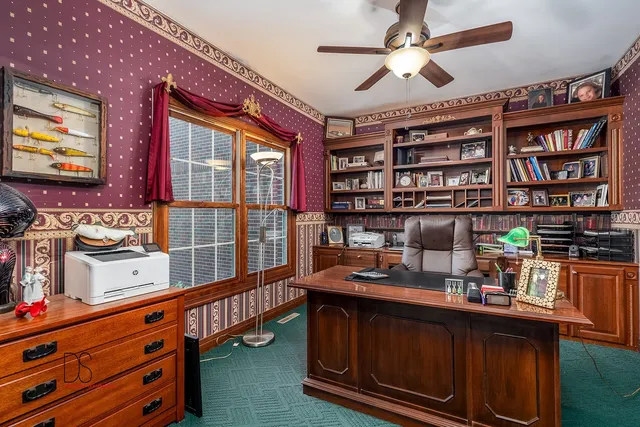 a kitchen with stainless steel appliances granite countertop a stove and cabinets