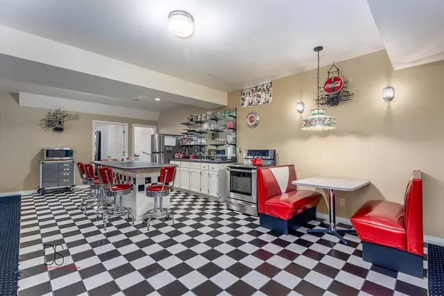 a living room with a couch and dining table