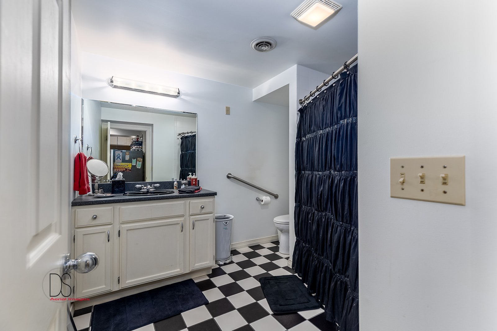 1638 Timber Lane Ottawa, IL 61350 - Photo 49 of 50 a bathroom with a sink a mirror and a shower