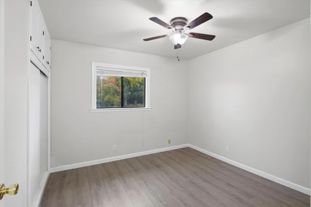 a bathroom with a toilet a sink and shower