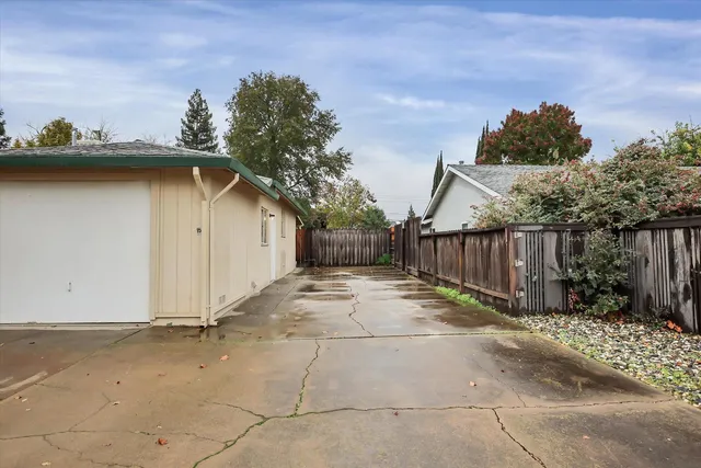 a backyard of a house with lots of green space