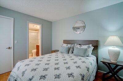 2018 South Federal Highway, Unit A301 Boynton Beach, FL 33435 - Photo 19 of 32 a bedroom with a bed and a lamp